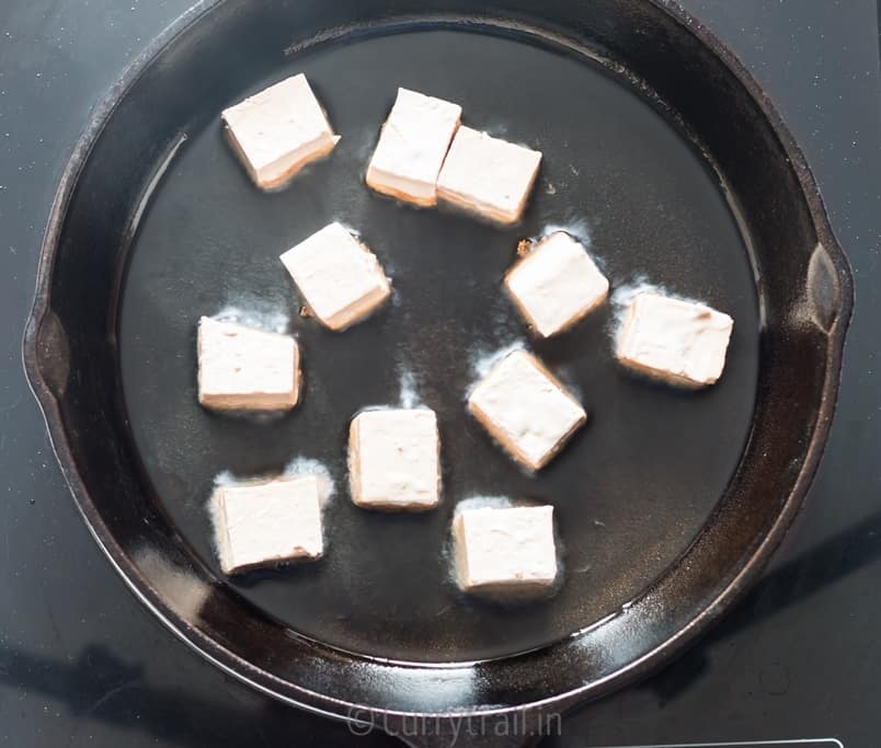 Frying marinated tofu cubes for general tso's tofu