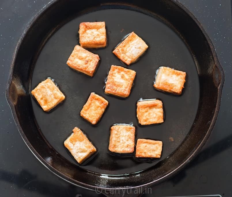 Frying marinated tofu cubes for general tso's tofu