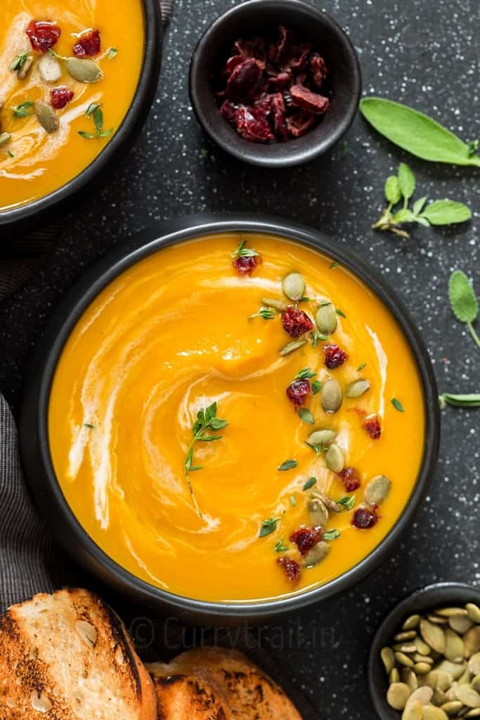 instant pot butternut squash soup served in 2 black bowl