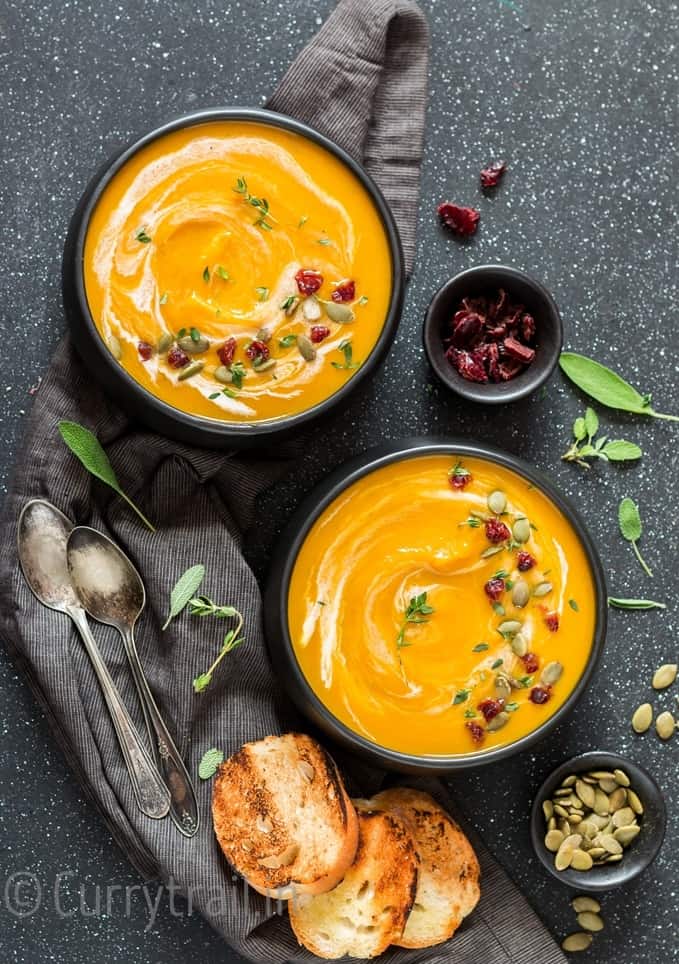 instant pot butternut squash soup served in 2 black bowl