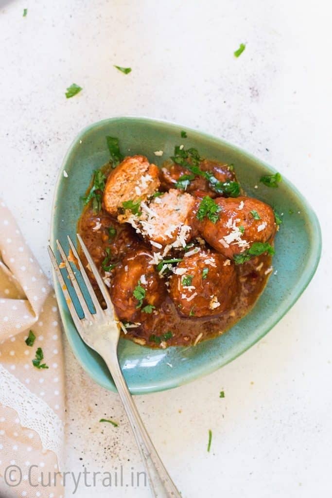 Instant pot chicken Parmesan meatballs on green plate