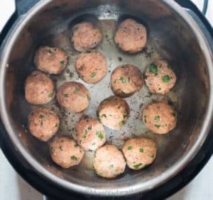 Instant pot chicken Parmesan meatballs sauteing meatballs in instant pot