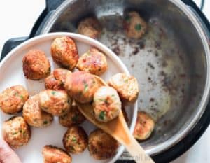 Instant pot chicken Parmesan meatballs removed to a plate