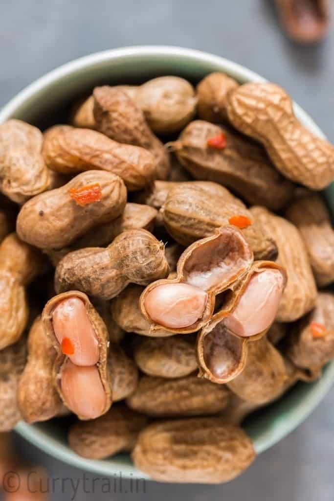 soft instant pot boiled peanuts with shell opened on few nuts in bowl