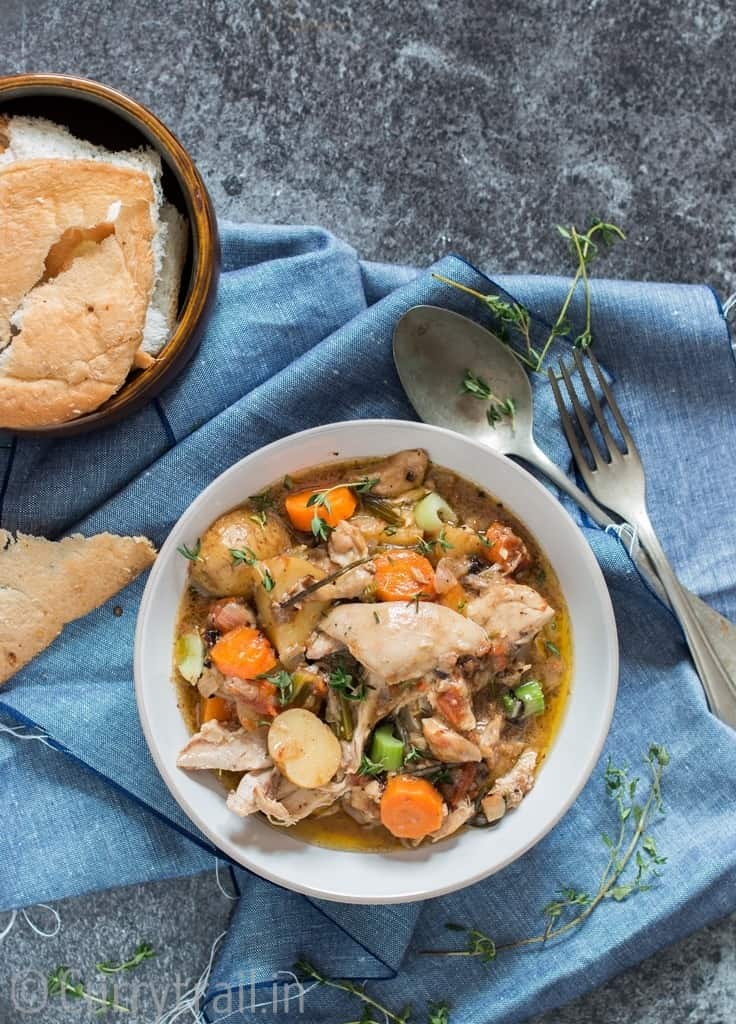 instant pot chicken stew served in white bowl