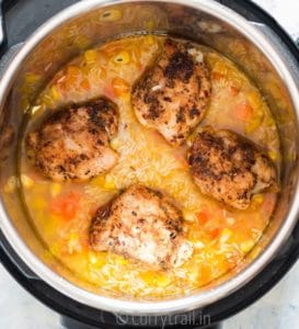 browned chicken thighs cooked along with rice in instant pot