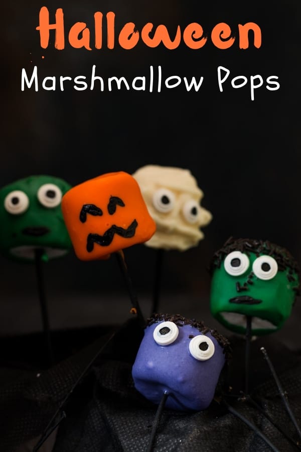 halloween marshmallow pops with text overlay