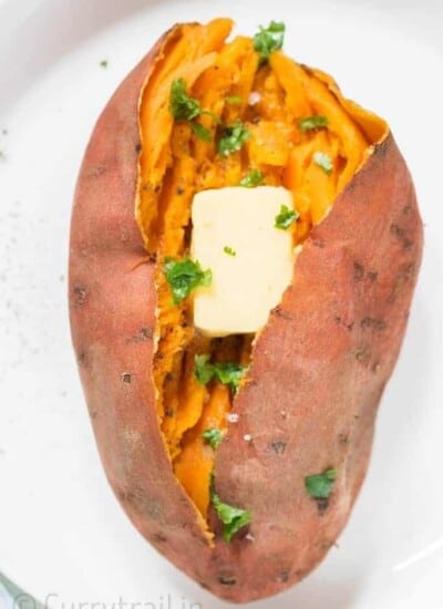 steamed and mashed sweet potatoes served with butter cube and sprinkle with cilantro