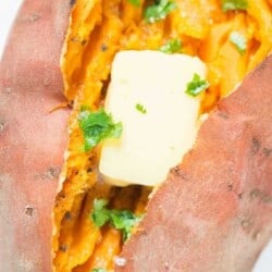 mashed sweet potatoes served with butter cube and sprinkle with cilantro