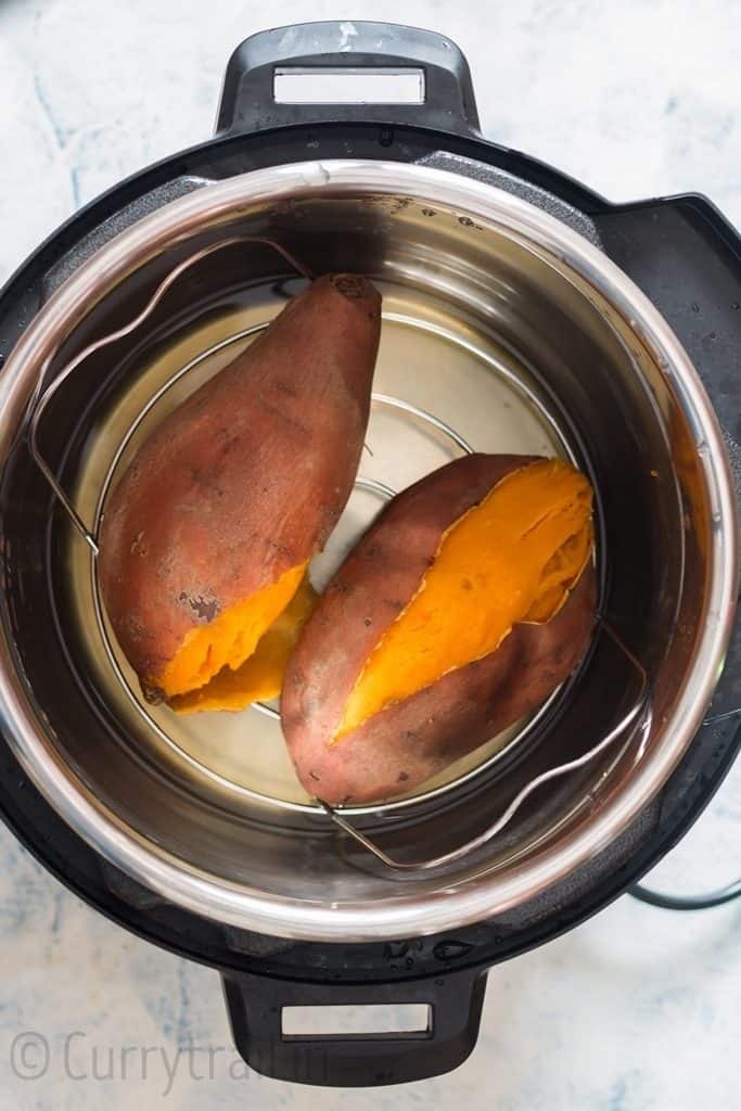 two sweet potatoes inside the pot