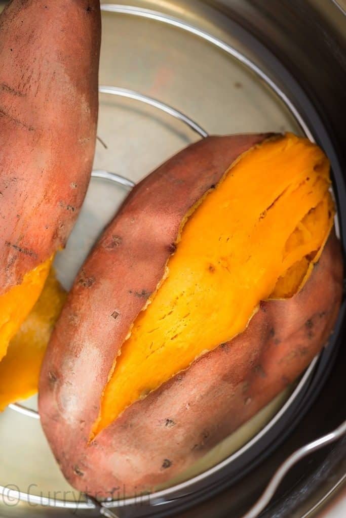 close up view of steamed instant pot sweet potatoes inside the pot