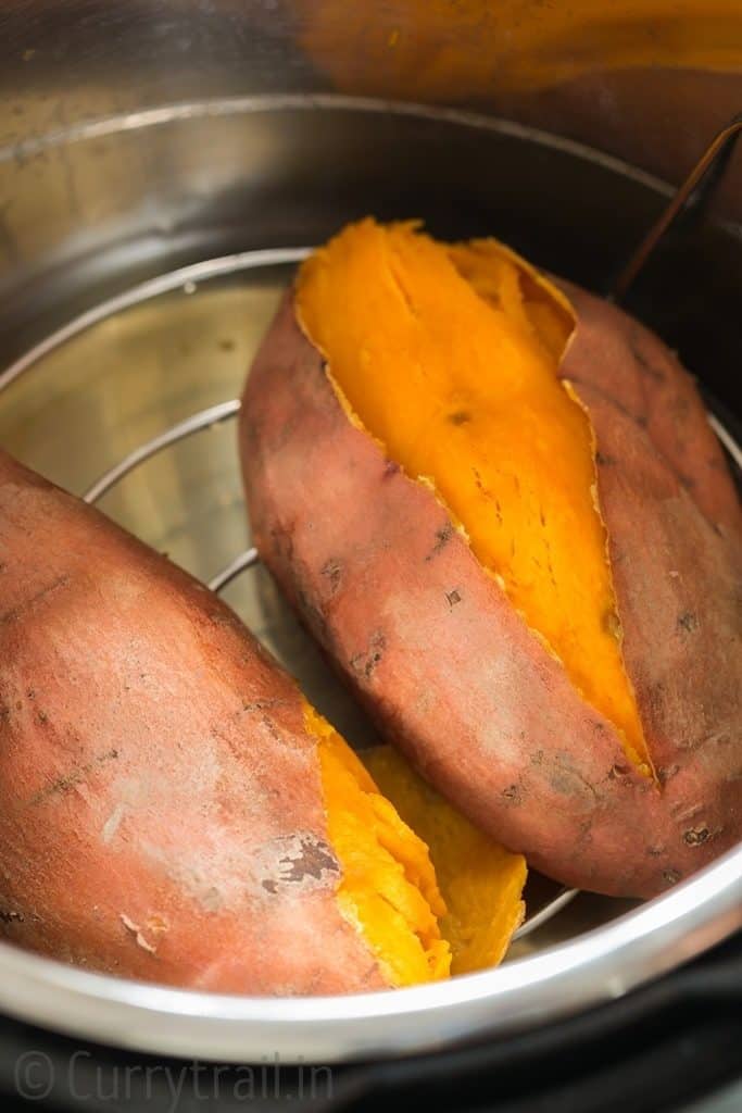 two steamed sweet potatoes inside the pot