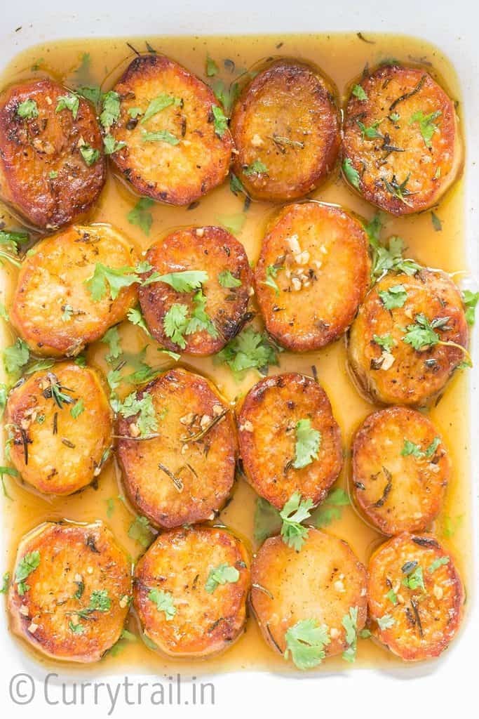 melting potatoes in white ceramic dish