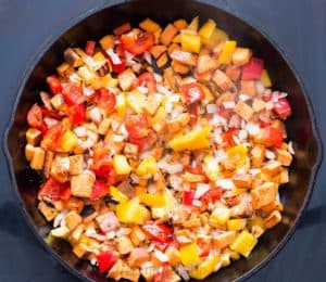 Sweet potato hash cooked in cast iron pan