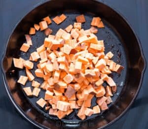 Sweet potatoes cooked in cast iron pan