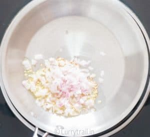 saute onions in pan for cooking quinoa stuffed butternut squash