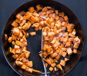 Sweet potatoes cooked in cast iron pan