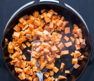 Sweet potatoes cooked in cast iron pan