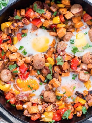 sweet potato hash with sausages and eggs