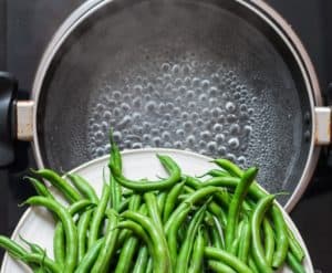 blanching green beans in boiling water