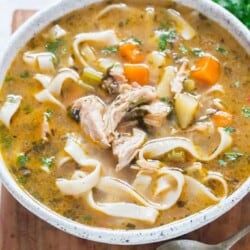 instant pot chicken noodles soup in white bowl