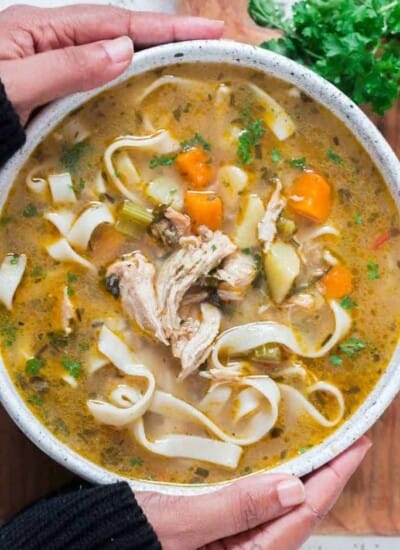 instant pot chicken noodles soup in white bowl