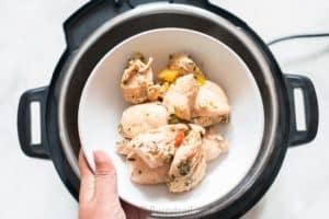 cooked chicken removed from instant pot chicken noodle soup to be shredded