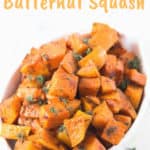roasted butternut squash in white bowl with text overlay