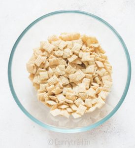 mixing puppy chow in a bowl