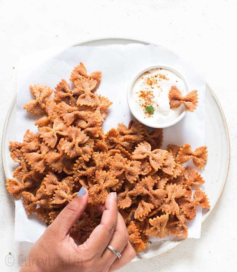 crispy pasta chips serving with dipping sauce