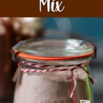 glass jar of hot cocoa mix with text overlay.