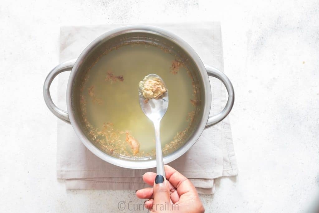 Steeping fresh ginger in hot water for honey lemon ginger tea