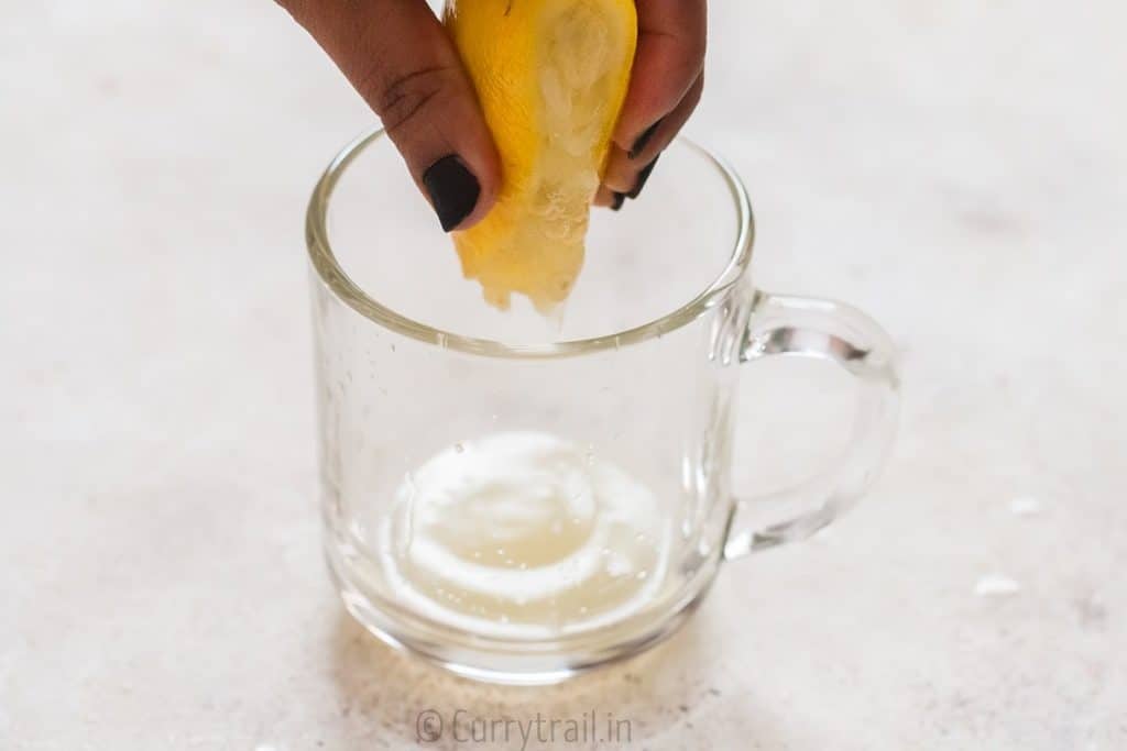 honey lemon ginger tea served in glass mug is soothing and refreshing drink that helps you fight cold and flu. It helps detox and calm you down during stress