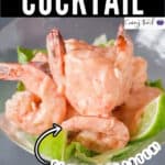 spicy prawn cocktail in martini glasses with lime wedges and text overlay