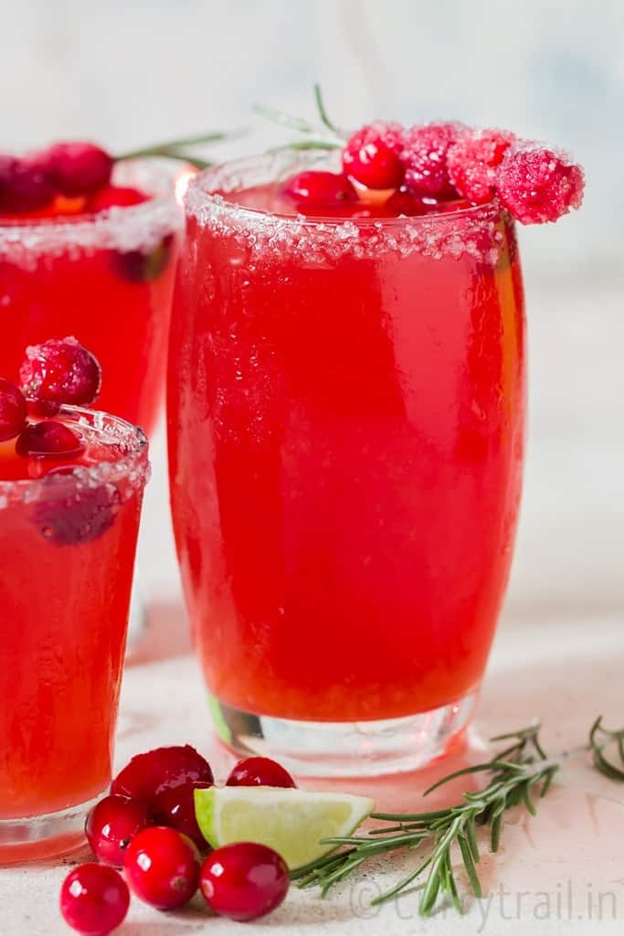 cranberry margaritas in 3 serving glasses