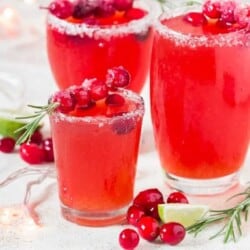 cranberry margaritas in 3 serving glasses