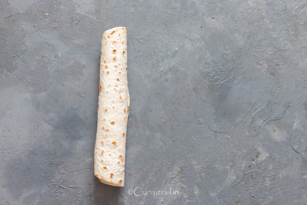 tortilla rolled with creamy chicken filling inside.