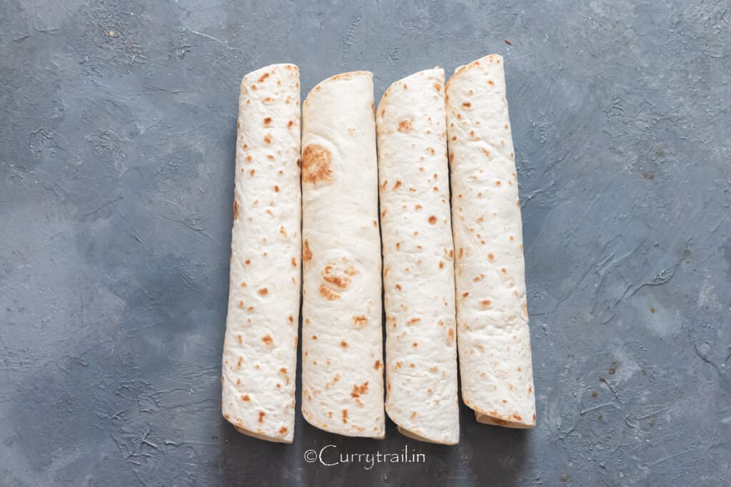 tortilla rolled with creamy chicken filling inside.