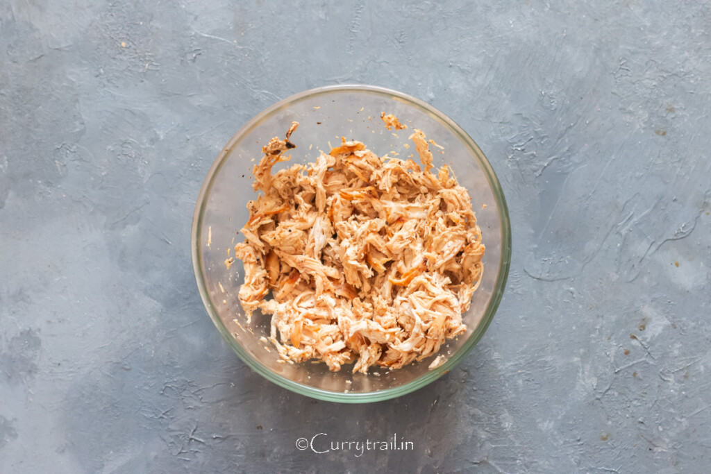 seared chicken breasts shredded into fine pieces.