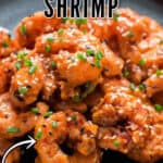 bang bang shrimp on black ceramic plate with text