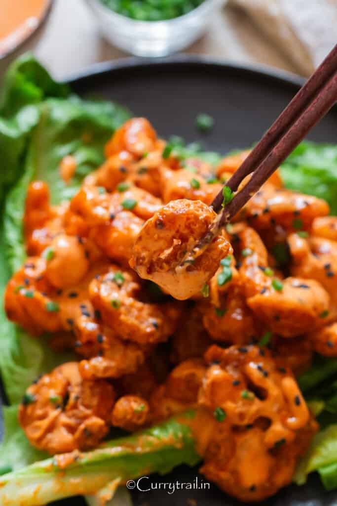 bang bang shrimp on lettuce leaf.