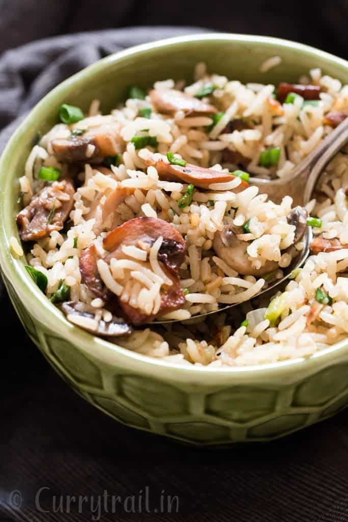 one pot mushroom rice in ceramic bowl