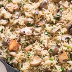 one pot mushroom rice cooked in cast iron skillet