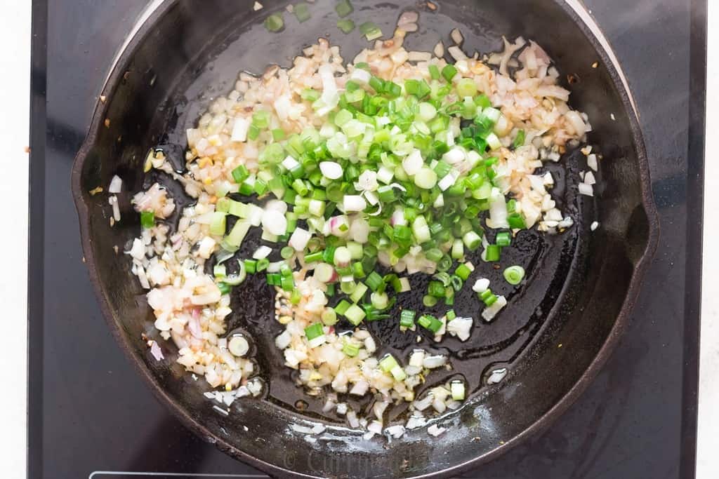 one pot mushroom rice cooked in cast iron skillet