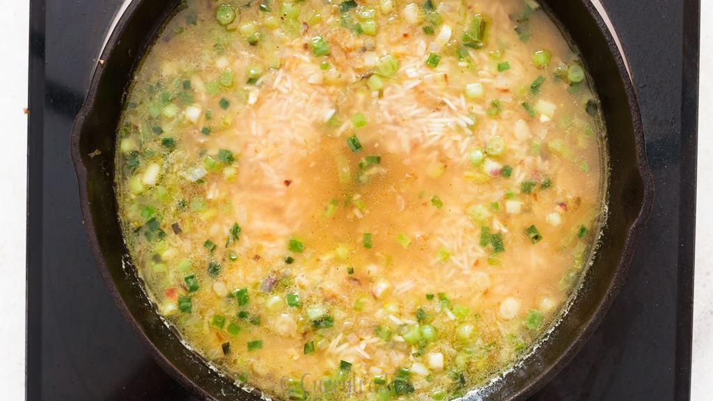 one pot mushroom rice cooked in cast iron skillet