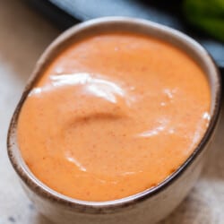 close up view of bang bang sauce in a bowl.