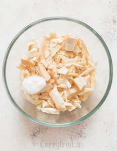 white chocolate with coconut oil in microwave bowl