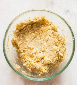 mixing cauliflower breadstick dough for cauliflower breadsticks