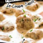 meatballs made from ground chicken in white cream sauce in cast iron pan with text