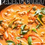 chicken panang curry in cast iron skillet with text